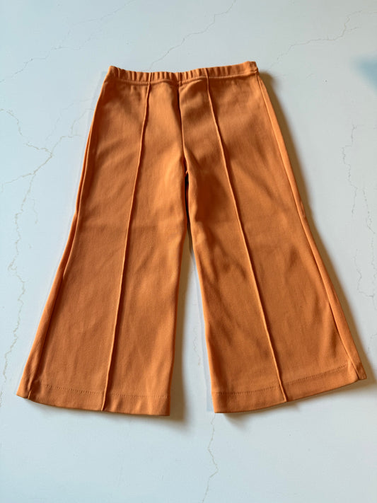 Vintage Kids Orange Elastic Waist Nylon Flare Pants from the 1960s